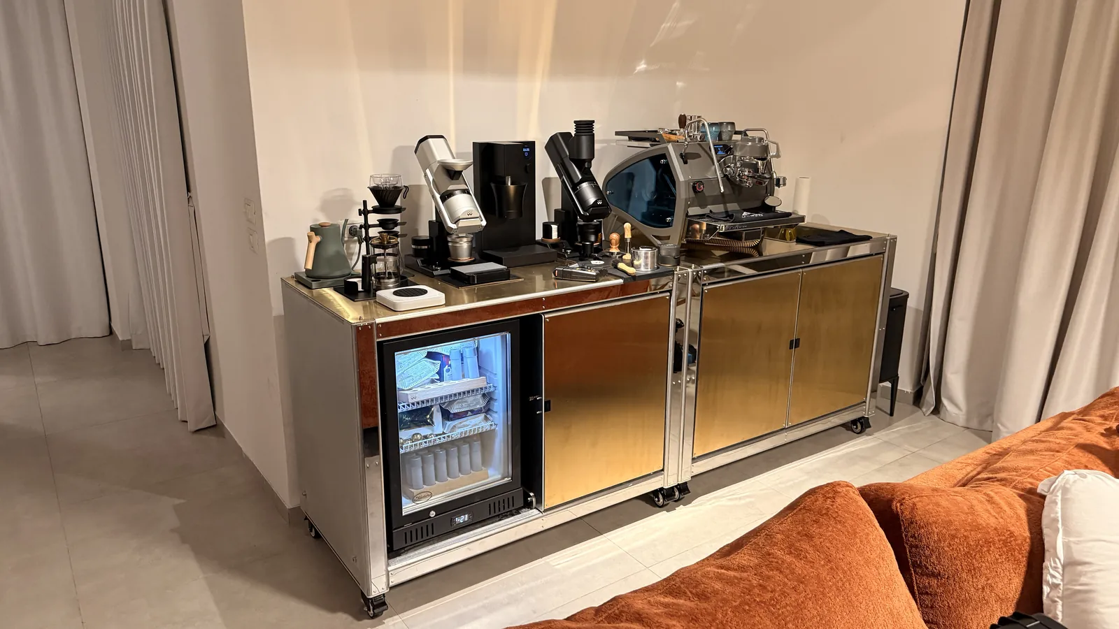 Cube Coffee standing against a curtained wall in the room it was made for.