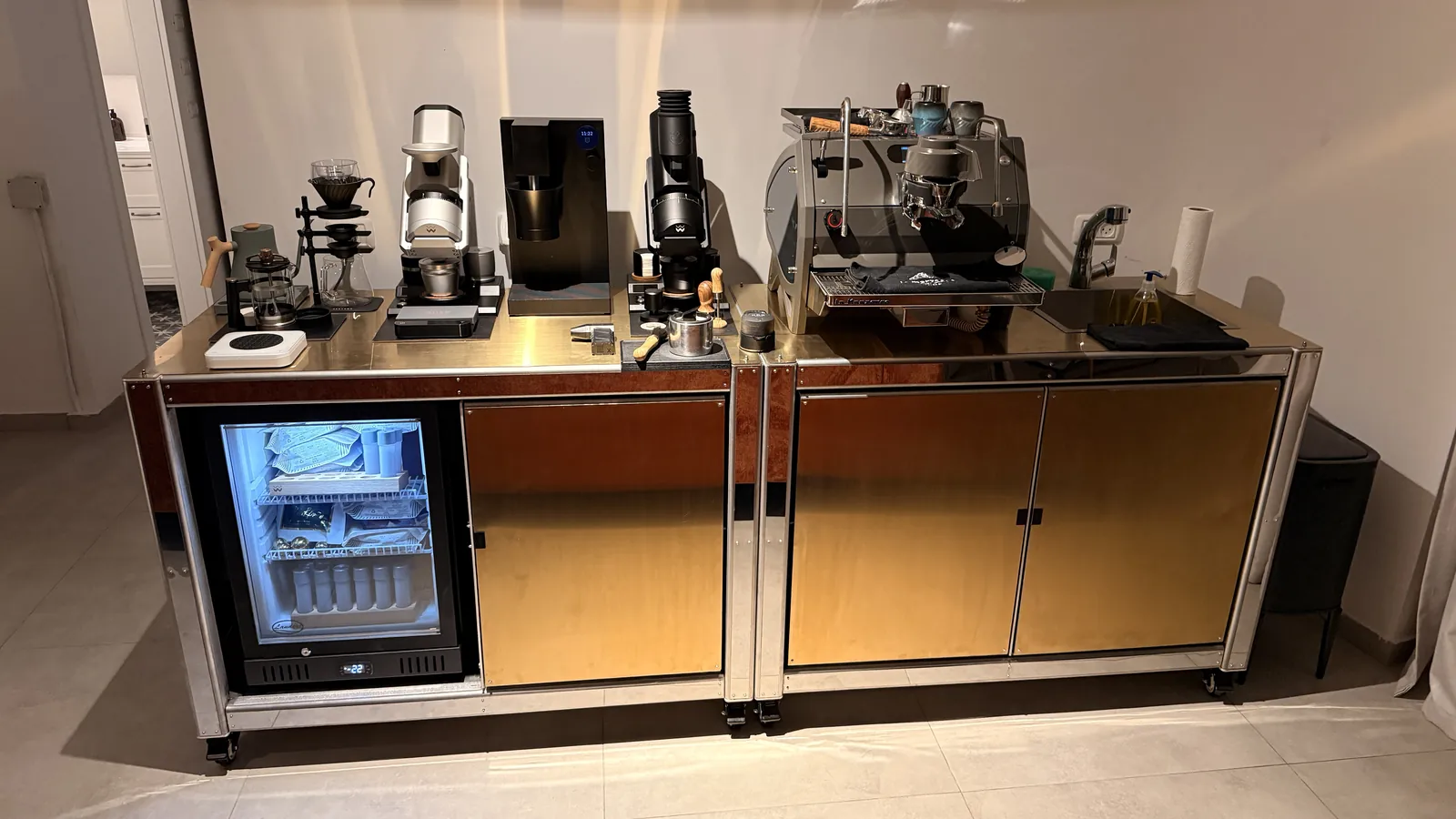 Three-quarter view of Cube Coffee with the copper doors closed.