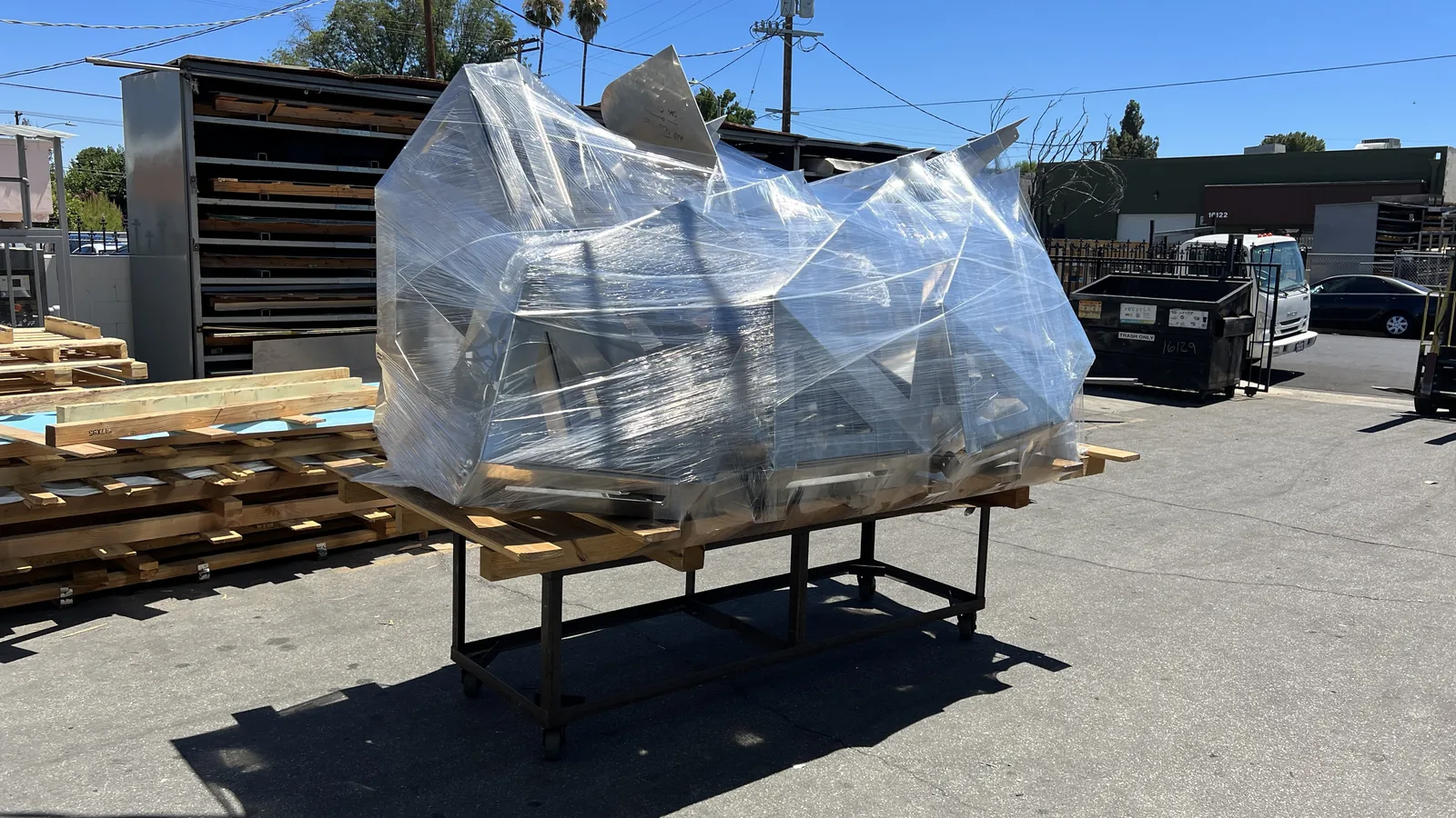 Diamond UFO wrapped on a cart outside the shop, ready to ship to the festival, 18 August 2023.