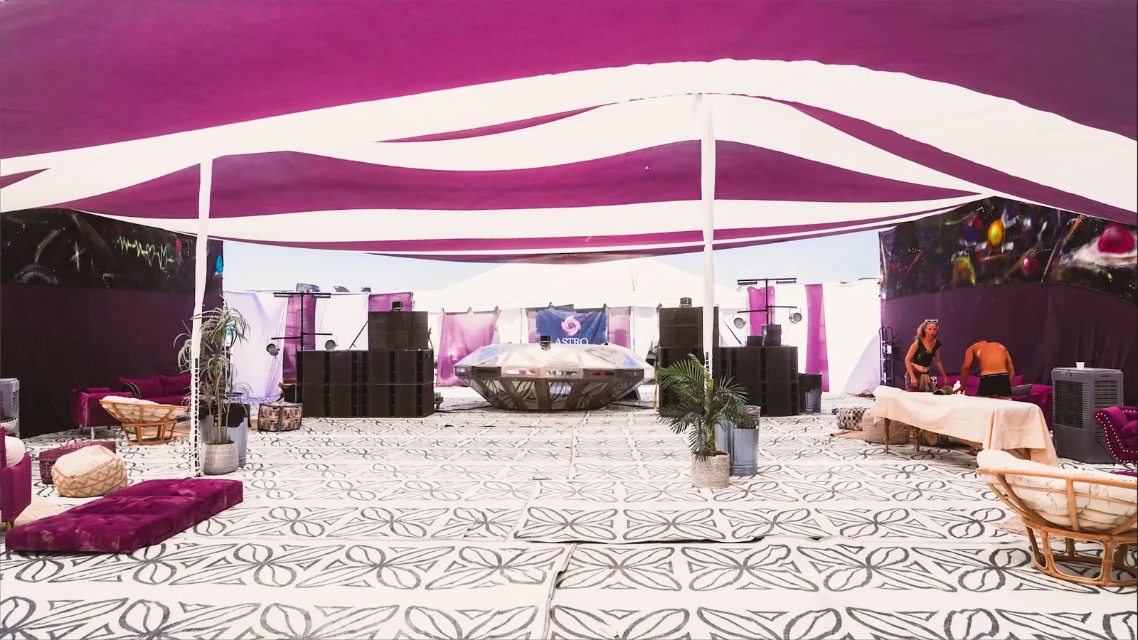 The Diamond UFO lit at the festival — fifty-five frosted facets glowing around the deck. A frame from video, not a photograph.