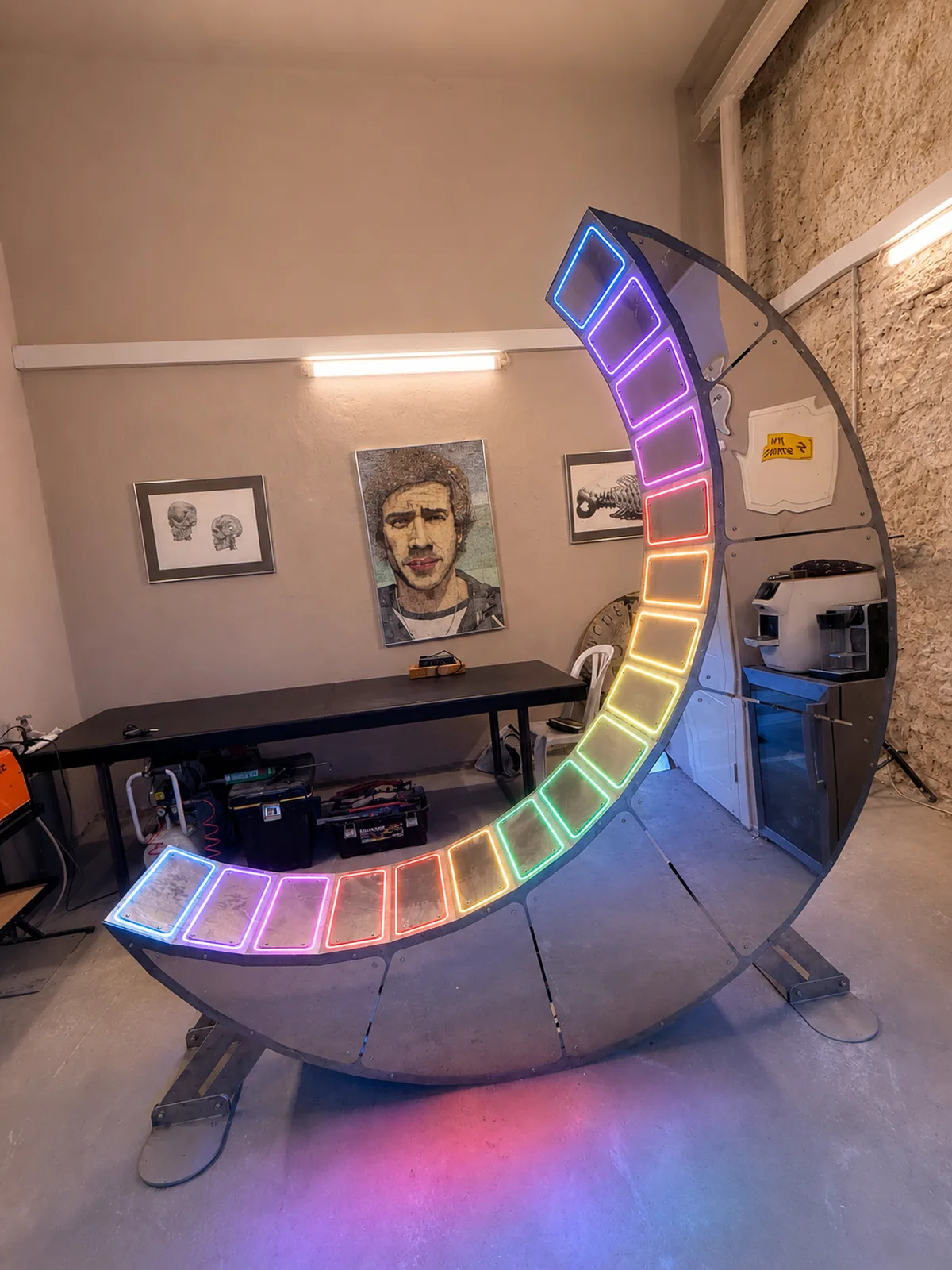 Moon Chair in the studio, the LED system running a full spectrum across the seat plates.